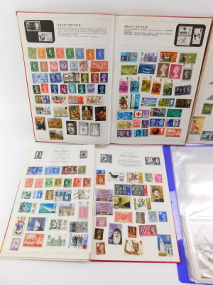 Philately. EII first day covers, pre and post decimalisation, together with two Stanley Gibbons Adventure stamp albums, containing used world stamps, together with a Royal Mail stamp album, containing similar. (a quantity) - 2