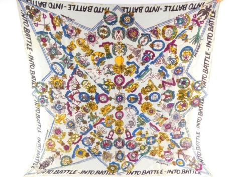 A Jacqmar WWII Into Battle propaganda scarf, decorated with regimental badges, against a pale blue ground, 89cm x 86cm.