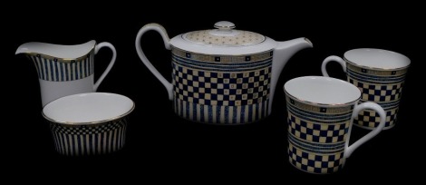 A Wedgwood porcelain breakfast tea set decorated in the Samurai pattern, comprising tea pot, cream jug, sugar bowl, and a pair of mugs.