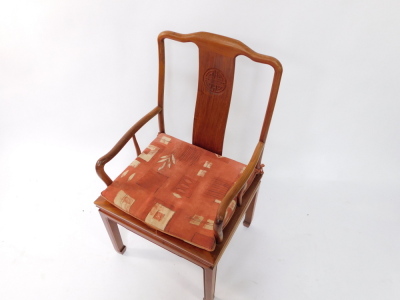 A Chinese hardwood open armchair, the solid splat carved with a central roundel, with a solid seat on shaped legs. - 2