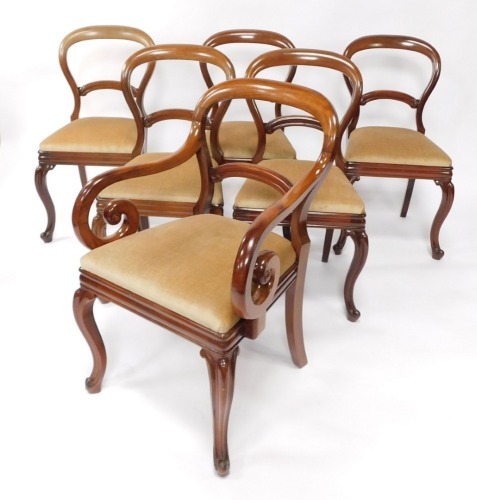 A set of six Victorian mahogany balloon back single dining chairs, with drop in seats, raised on cabriole legs.