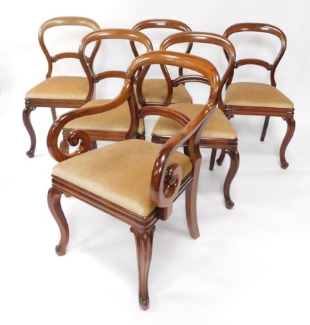 A set of six Victorian mahogany balloon back single dining chairs, with drop in seats, raised on cabriole legs.