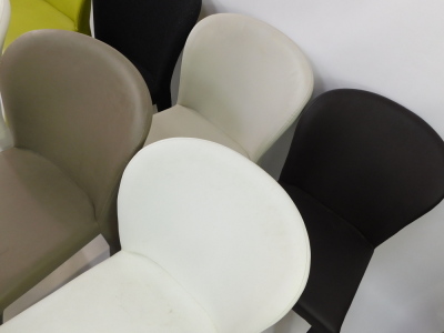 A harlequin set of eight of leather and felt upholstered dining chairs, three in cream, one pale brown, one dark brown, two green, and the felt chair in black. - 3