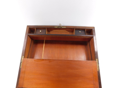 A Victorian rosewood and mahogany cross banded writing slope, with brass cartouche and key escutcheon, opening to reveal a fitted interior, with key, 17.5cm high, 50.5cm wide, 26.5cm deep. (AF) - 4