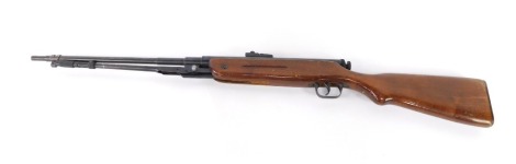 A Lion Brand spring powered air rifle, calibre .22.