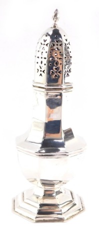 An Edward VII silver sugar sifter, of octagonal baluster form, Birmingham 1903, 6.65oz, 22cm high.