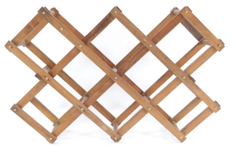 A wooden concertina eight bottle folding wine rack, 57cm wide extended.