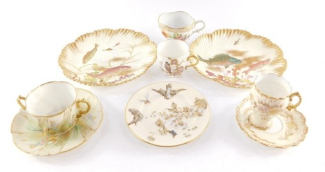 A pair of Havilland and Cie Limoges late 19thC porcelain plates, painted with fish, retailed by R J Allen Son & Company, Philadelphia, USA, together with an E. Kaluber twin handled fluted cup and saucer, a Limoges porcelain cabinet cup and saucer, further