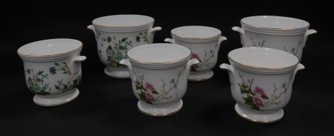 A group of Crown Staffordshire jardinieres, comprising a set of three Tibet pattern planters, one large and three small, and three Kowloon pattern, one large and one small, largest 12cm high, smallest 10cm high. (6)