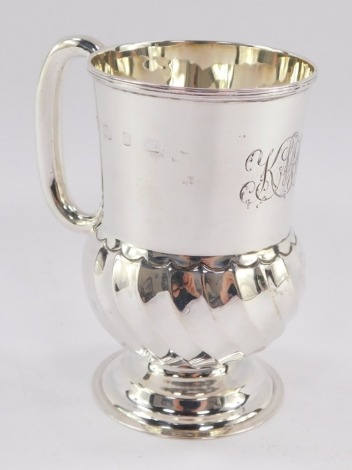 A Victorian silver semi spiral fluted tankard, monogram engraved, Thomas Hayes, Birmingham 1897, 3.45oz.