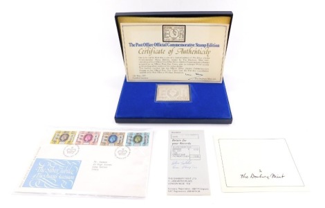 A Danbury Mint Silver Jubilee 1952-1977 silver collectors stamp, boxed.