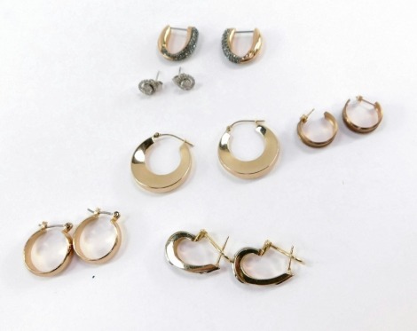 A group of six pairs of earrings, to include a pair of Swarovski Crystal hoop earrings, a pair of gold finish hoop earrings, a set of 14ct gold and cz set earrings, 8.8g, two pairs of 9ct gold hoops, 3.3g, and a pair of 9ct white gold and cz set cluster e