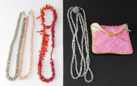 A group of various necklaces, to include a coral beaded necklace with chrome clasp, two glass beaded graduated necklaces and a three strand vintage necklace. (a quantity)