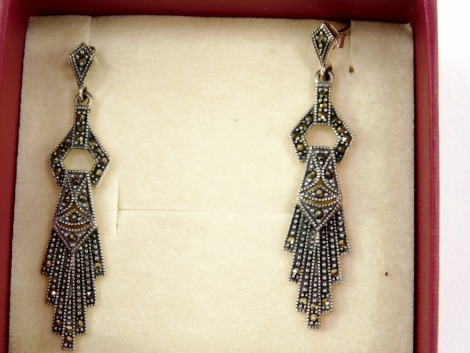 A pair of Art Deco style silver and marcasite set earrings, each of fan design stamped 925, with butterfly backs, 5cm high. (boxed)