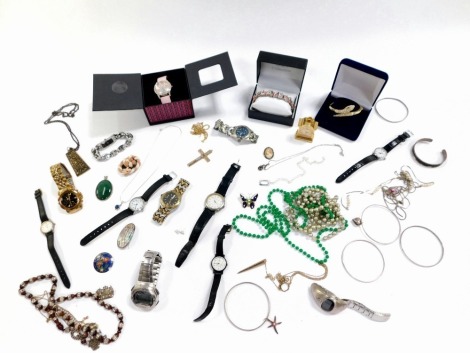 A group of costume jewellery and effects, to include a jadeite oval pendant in a white metal frame stamped 925, a Mexican mother of pearl and silver backed brooch, together with various wristwatches, snake bangle, silver necklaces, etc. (1 tray)