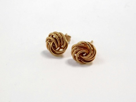 A pair of 9ct gold knot twist earrings, on butterfly backs, 1.9g.