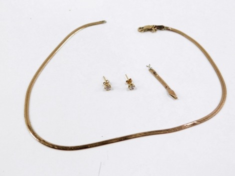 A group of jewellery, comprising a yellow metal necklace, stamped 9kt (AF), and a pair of CZ and 9ct gold studs, 5.9g.