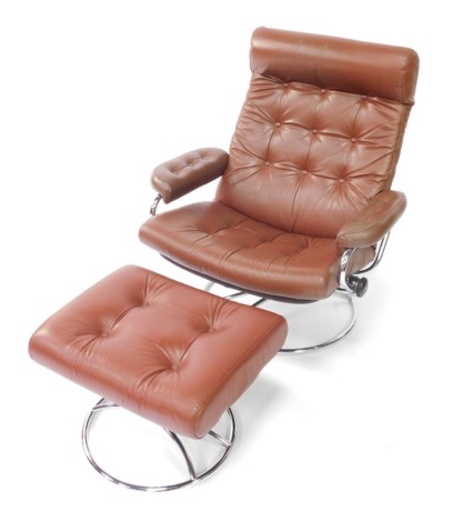 An Ekornes Stressless brown leather and chrome armchair, with button back and adjustable swivel base, and a matching stool.