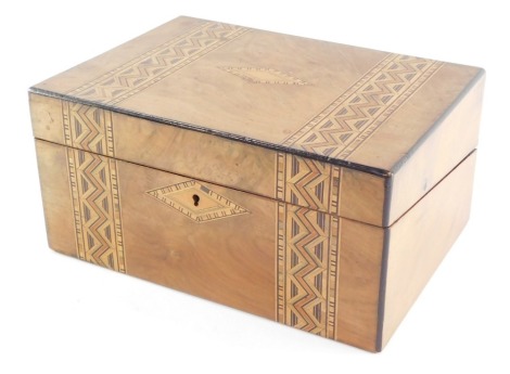 A Victorian walnut and parquetry writing box, with fitted interior, 29.5cm wide.