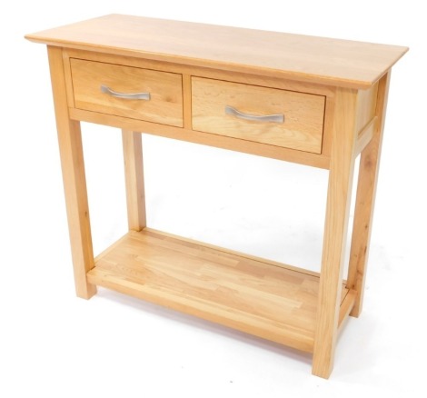 An oak side table, with two frieze drawers, above an under tier, 78cm high, 85cm wide, 35cm deep.