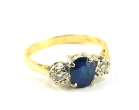 An 18ct gold sapphire and diamond three stone ring, size N, 3.3g.