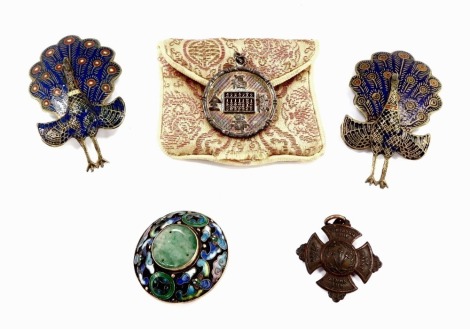 A pair of Siam silver and enamel peacock clip brooches, Chinese silver abacus pendant, silver jade and enamel brooch decorated with bats, and a companionship pendant. (a quantity)