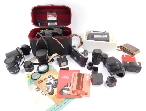 A Kodak Eastman camera, US Patent 1913, two Asahi Pentax spotmatic cameras, Bell & Howell auto load Cine camera, lens, etc. (a quantity)