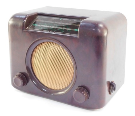 A Bush brown Bakelite radio, type DAC90A, serial number 73/185300, 30.5cm wide.