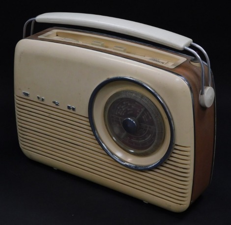 A Bush brown and cream Bakelite radio, type VTR103, serial number 462/27094, 33cm wide.