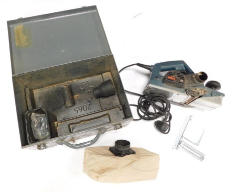 A Bosch electric planer, model GHO 31 - 82, boxed, with accessories.