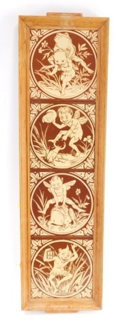 A set of four Minton late 19thC pottery Elfin Series tiles, printed in brown and white, wooden tray frame, each 15cm x 15cm.