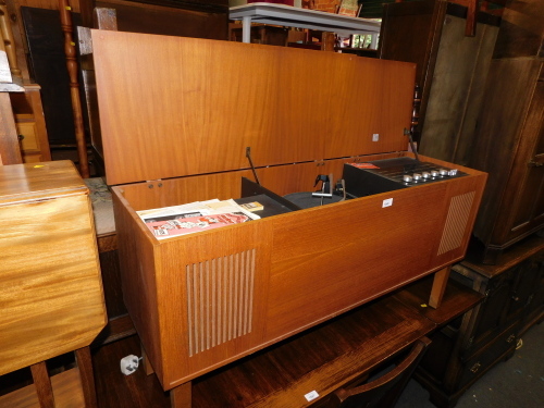 A Garrard 2025T radiogramme, in a teak cabinet.