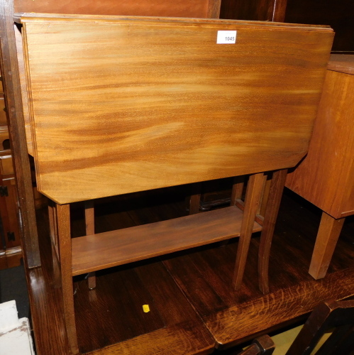 An Edwardian satinwood Sutherland table.