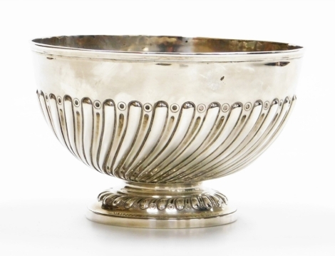 A Victorian silver punch bowl, with a wrythen body, on a stepped foot rim, London 1891, 11cm high, 18cm diameter, 12½oz.