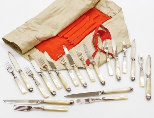 A silver and mother of pearl handled ten piece knife and fork set, the knife ends and blades being silver, maker MB, London assay, the forks plated, in material sleeve.