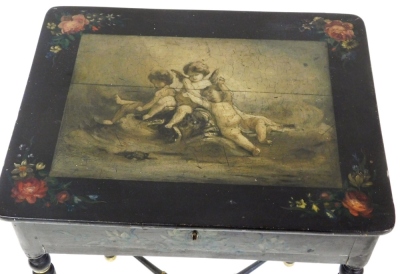 A 19thC French parcel gilt and ebonised work table, with en grisaille painted top of cherubs, and rose outer border, on X frame cross base, 69cm high, 45cm wide, 35cm deep. - 2