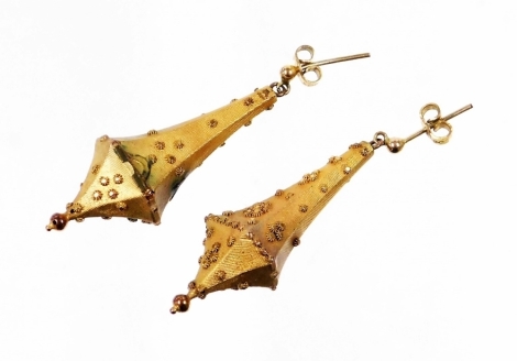 A pair of Victorian style drop earrings, each in the form of a drop with applied floral detailing, gilt metal, 4.5cm high, in Oclee & Son of Folkestone box.