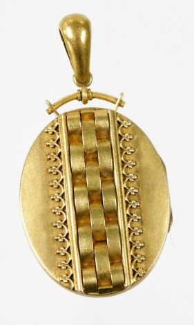 A Victorian bloomed gold locket, with oval frontage with central three weave interlinked design, with floral outer banding on single loop, unmarked, the pendant 5cm high, 17.4g all in.