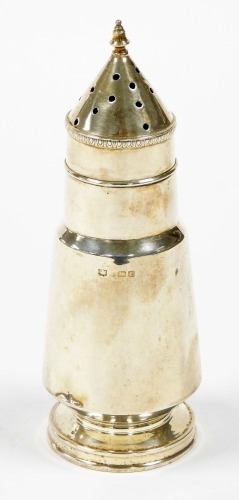 A George V Art Deco conical silver sugar castor, Birmingham 1935, 17cm high, 2¾oz. (AF)