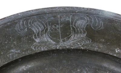 A large early 19thC pewter charger, with shielded feathers, probably continental, partial touch mark, 56cm diameter. - 2