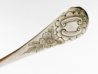 A George III silver berry spoon, the curved handle with foliate detailing, London 1786, 2½oz, in later case. - 3