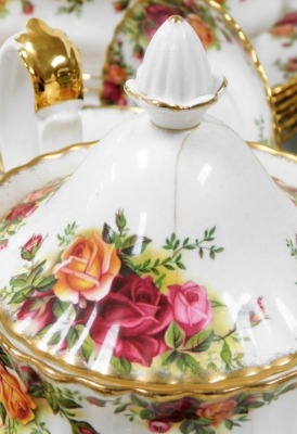 A group of Royal Albert Old Country Roses tea and dinner wares, comprising coffee pot, teapot, tureens and lids, salt and pepper shaker, small milk jug, sugar bowl, rectangular tray, gravy boat and saucer, nineteen teacups, eighteen saucers, one condiment - 5