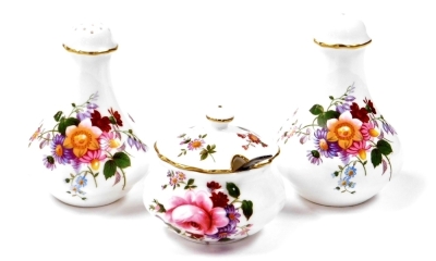 Royal Crown Derby porcelain, to include a pair of salt and pepper pots and a Derby Posies jar and cover with a silver spoon.