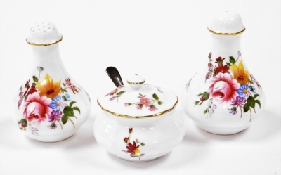 Royal Crown Derby porcelain, to include a pair of salt and pepper pots and a Derby Posies jar and cover with a silver spoon. - 2