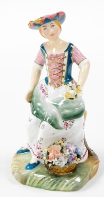 A Royal Crown Derby boxed figure of The Flower Seller, in flowing dress holding daffodils, signed J Bryan, LVII, 20cm high, boxed with certificate. - 2