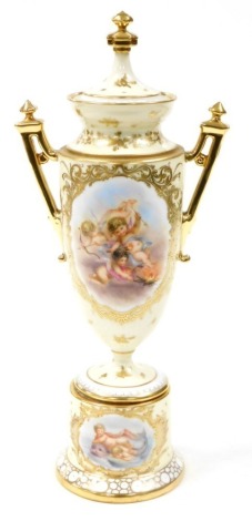 A 19thC Dresden urnular vase and cover, heavily gilt decorated with coloured panels of cherubs to centre with two handles on a stepped and rounded base with blue Dresden stamp to underside and 18819, 44cm high.