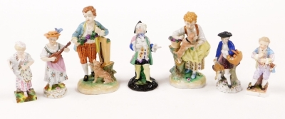 A group of Continental porcelain figures, some Dresden, to include a Dresden figure of a female playing mandolin 13cm high, a pair of girl and boy with dog figure groups 15cm high, a figure of a child playing flute (AF) 11cm high stamped Dresden, and thre