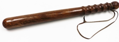 A turned rosewood policeman's truncheon, 39cm long.