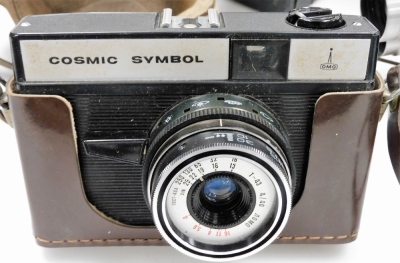 A group of camera equipment, to include a Pentax Optio S5I, Kodak box camera, a Keystone Electric Eye K-4C, a Carina Computer, a Nomo Cosmic Symbol and a Praktica Prinz Galaxy 1-4.5 lens. - 2