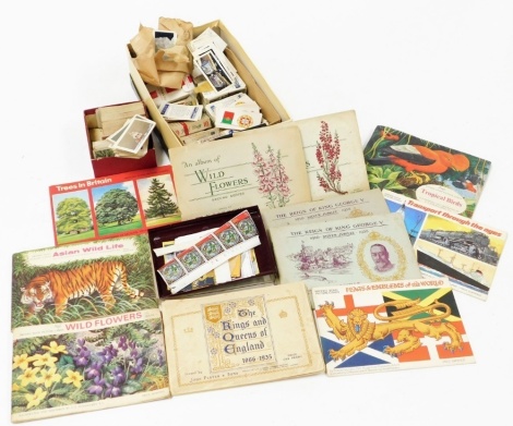 A group of cigarette, tea and trade cards, loose stamps, Brooke Bond tea cards, etc. (a quantity)